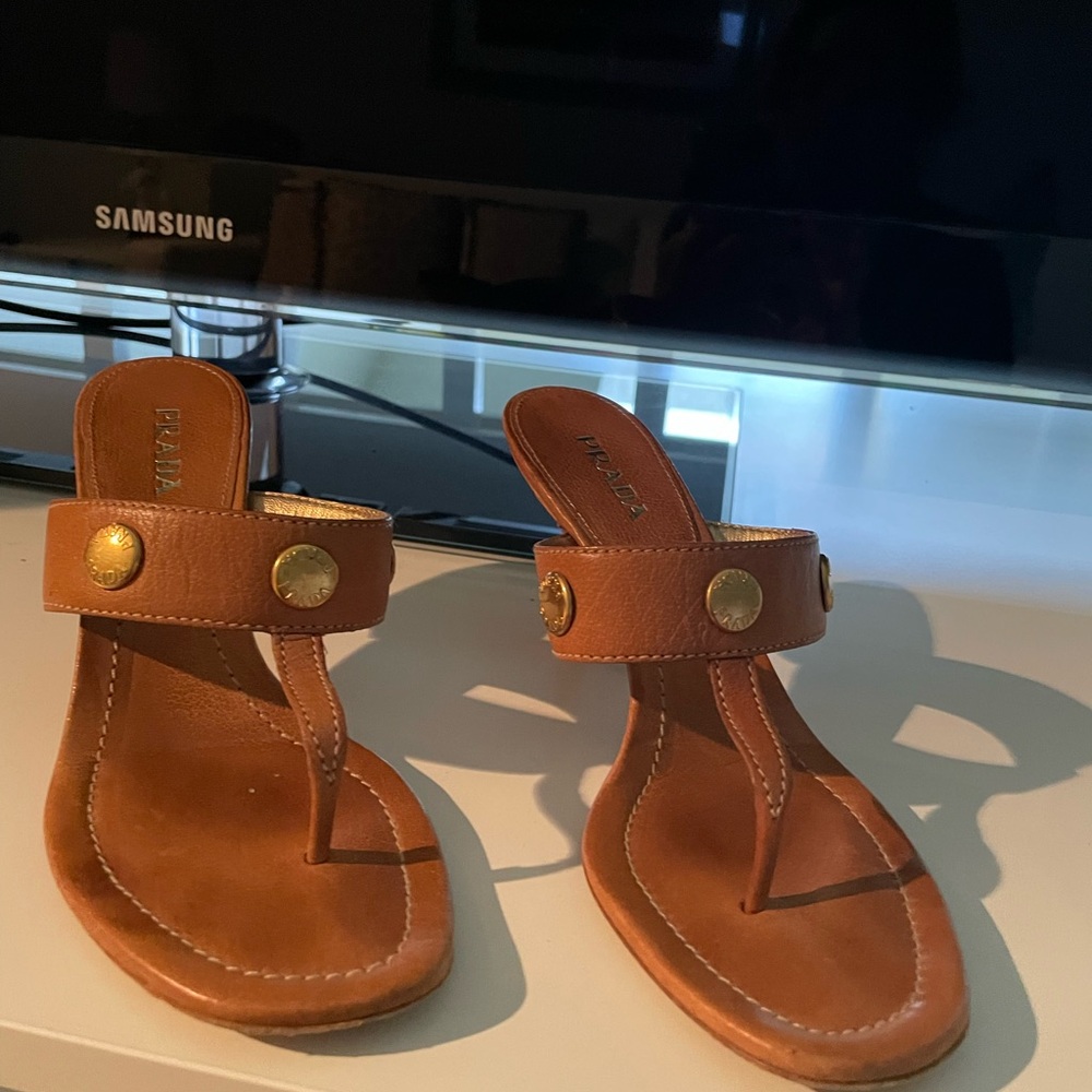 Prada thong w heel.  Natural color w three gold Prada on top.